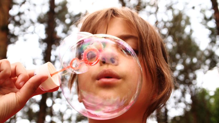 A experiment with bubbles can be a fun science activity for the entire family.