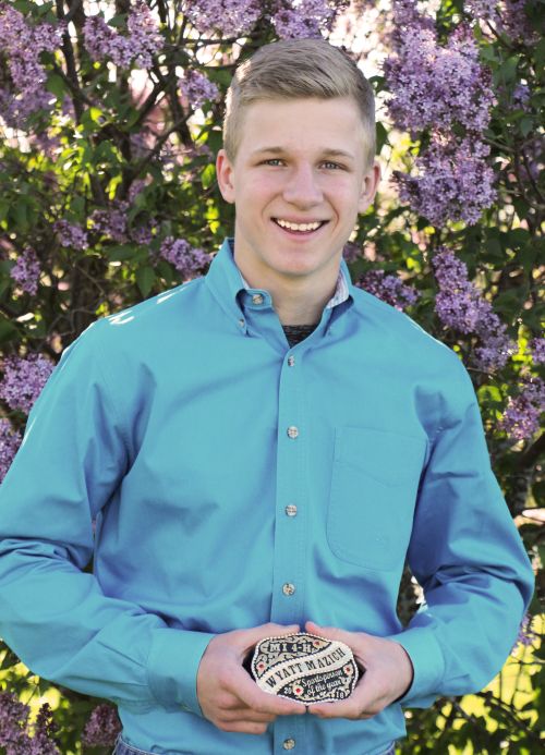 Wyatt Mazich with his 2016 Michigan 4-H Animal Science Sportsperson of the Year buckle.