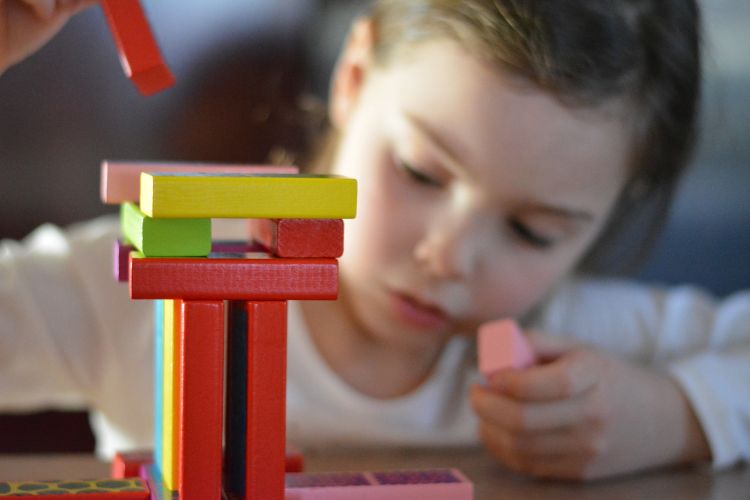 Kid playing with blocks