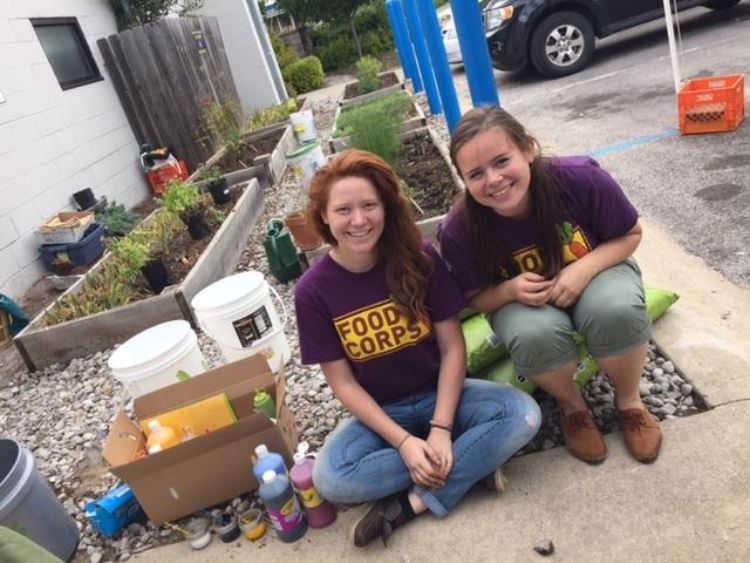 Stephanie and Mikaela partnered with the Father Fred Foundation to restore garden beds on the 9/11 National Day of Service. Photo credit: Meghan McDermott