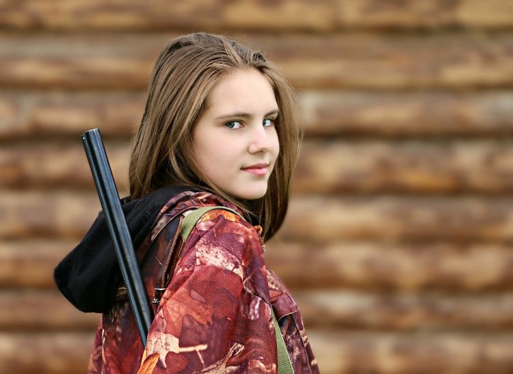Girl with a hunting rifle