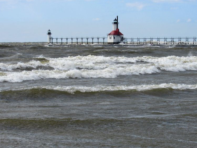 South Haven pier is shown surrounded by waves and high waters in April 2020. Photo: Courtesy of J. Sandberg