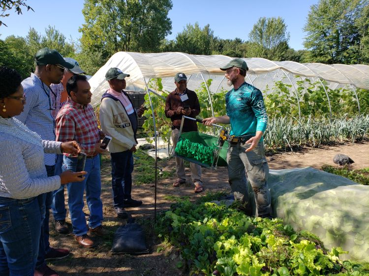 Members of the Cochran Fellowship Program - Nigeria Farm Management group visit Sower's Purse Microfarm in Benton Harbor.