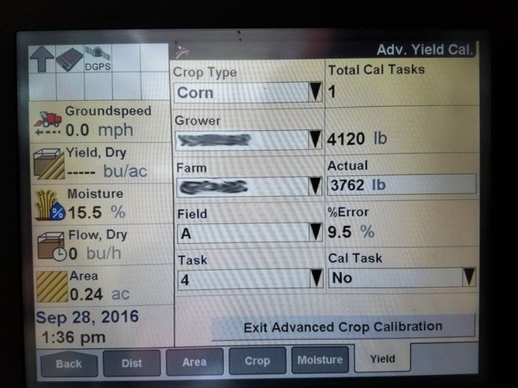 yield monitor screen showing the calibration functions on a combine.