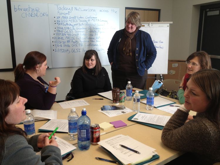 (1)	4-H Program Coordinator, Leigh Ann Theunick, facilitates a small group discussion about potential future place-based projects and how these connect with school learning goals.