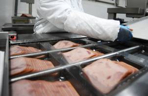 Meat is sliced following the Specialized Retail Meat Processing Variance requirement.