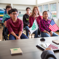 Youth in a 4-H club meeting