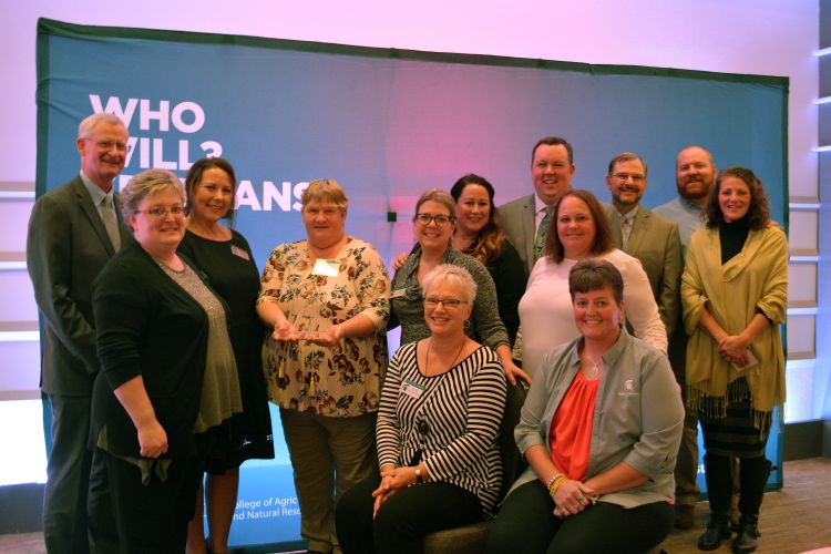 Award winners pose with director and MSU Extension staff.