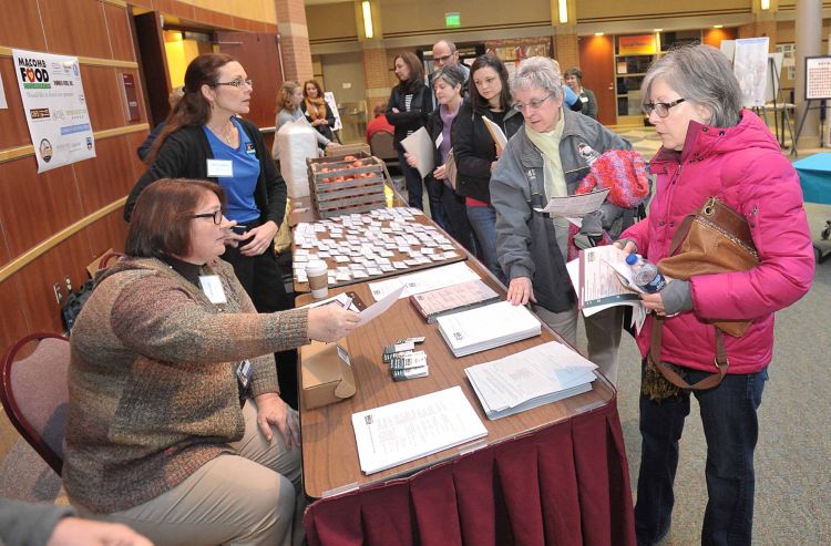 Volunteers assisting attendees with sign in before the conference. Photo credit: David Dalton, Macomb Food Collaborative