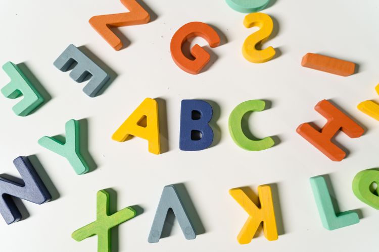 Various letter magnets strewn about with 