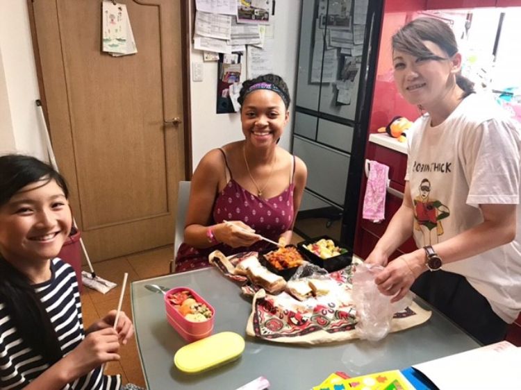 Michigan outbound youth delegate Saudia Tate eating traditional Japanese food with her host family. Photo by Saudia Tate.