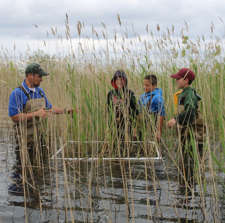 Michigan Sea Grant's Brandon Schroeder works with students on a project. Photo: Michigan State University Extension