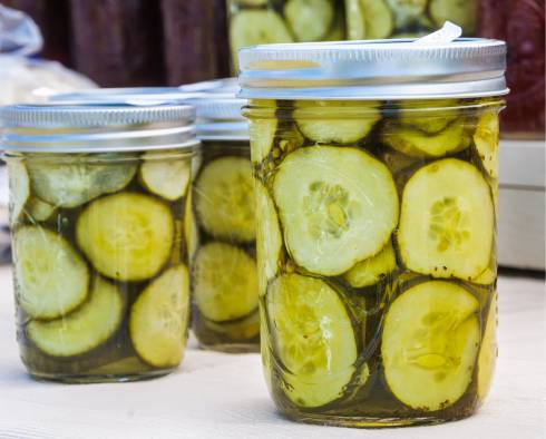 Pickles in canning jars.