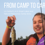 Liz Seifert catching a fish at camp in 2009.