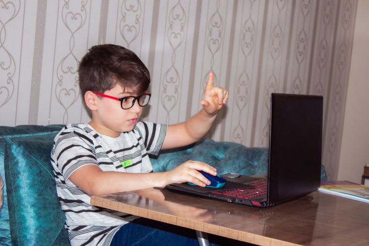 Kid on a computer