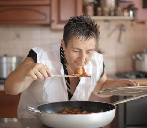 Women cooking in kitchen