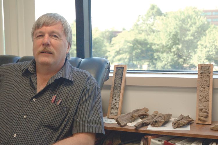 Martin Rosek sits in his office in East Lansing, Michigan