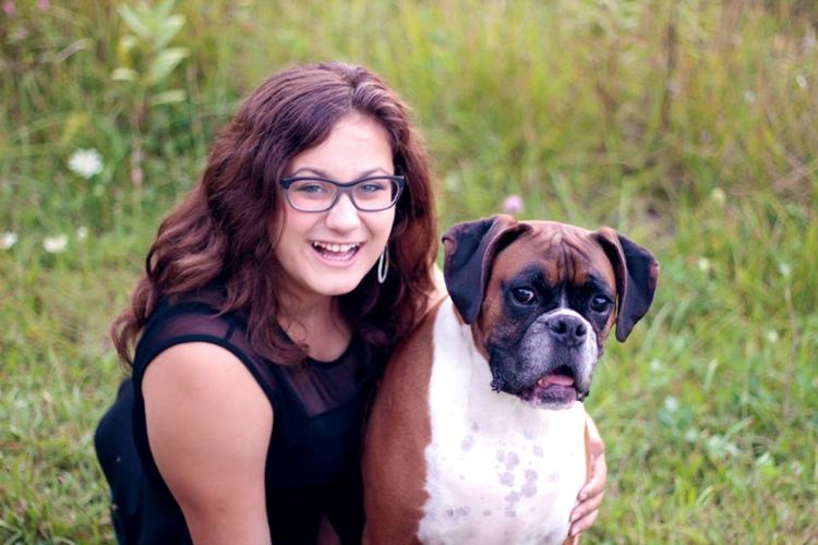 Lansing youth Kendra Rocha and her dog Nova