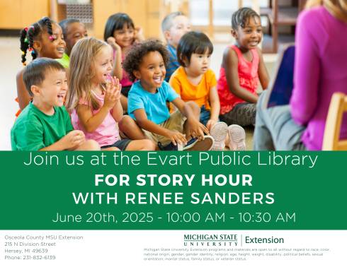 Kids circled around an adult reading to them with event flyer information