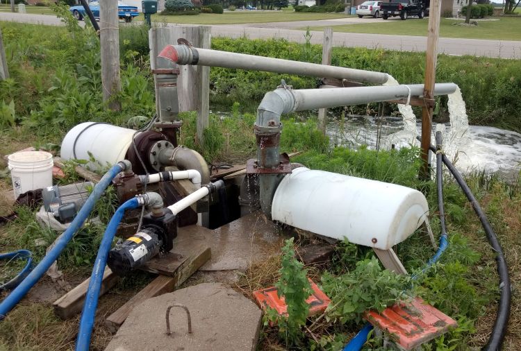 Two nights and two days running four pumps in Essexville, Michigan. Ditches filled and drainage backed up into some fields. Photo by Ben Phillips, MSU Extension.