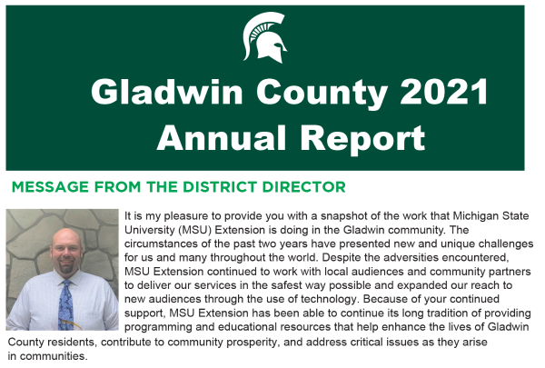 front cover of annual report with green background, title in bold, white font and letter from district director