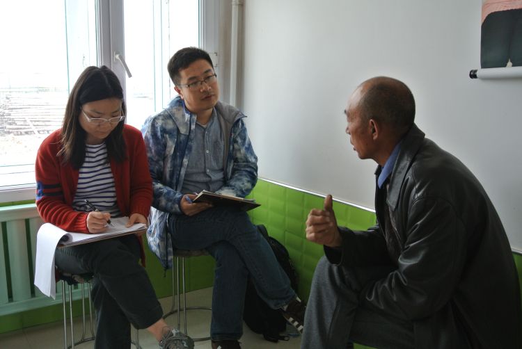 MSU scientists interview a farmer in Heilongjiang China
