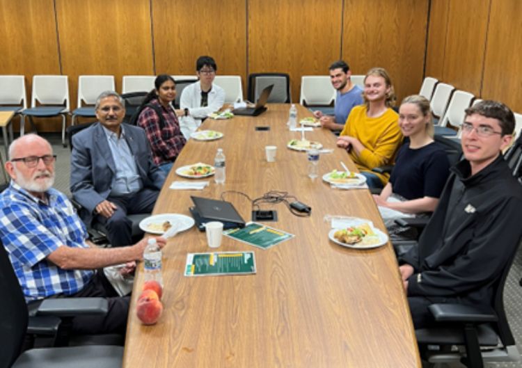 Dr Ravi Singh, (photo second person from left), Distinguished Scientist and Head of Global Wheat Improvement CIMMYT and the second annual guest in the “Leadership in Plant Breeding for Global Food Security” seminar series-- enjoys lunch with host Russell Freed (photo: leftmost) and a group of curious graduate students around the conference room table.