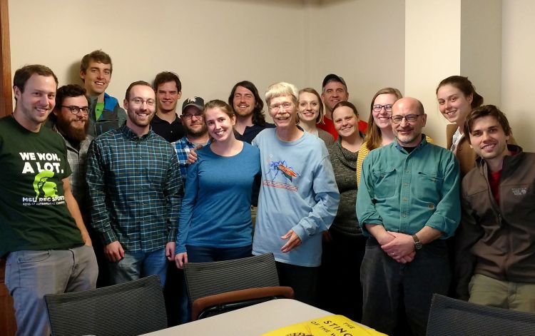 Justin Schmidt (middle) with students from the Entomology Department.