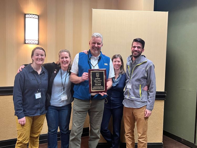 Gary Roloff receiving award