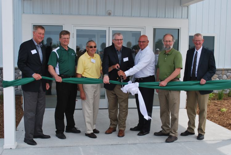 Representatives from MSU and the agriculture industry cut the ribbon at the new SVREC Agricultural Education Center.