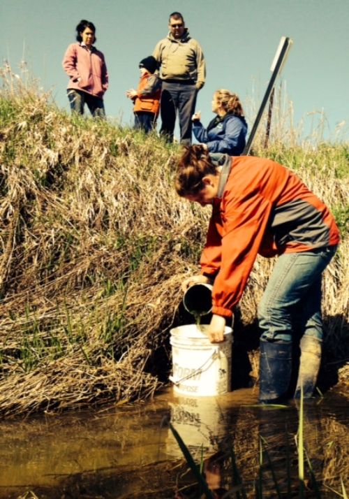 Measuring flow rate as part of tile monitoring being done in Hillsdale County through a partnership between land owners, the local Conservation District and MSU Extension. | Photo: MSU Extension