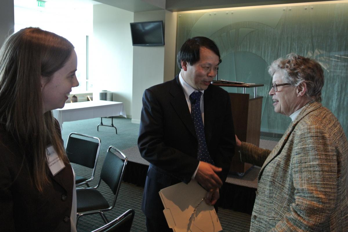 Vanessa Hull, Jack Liu and President Lou Anna K. Simon