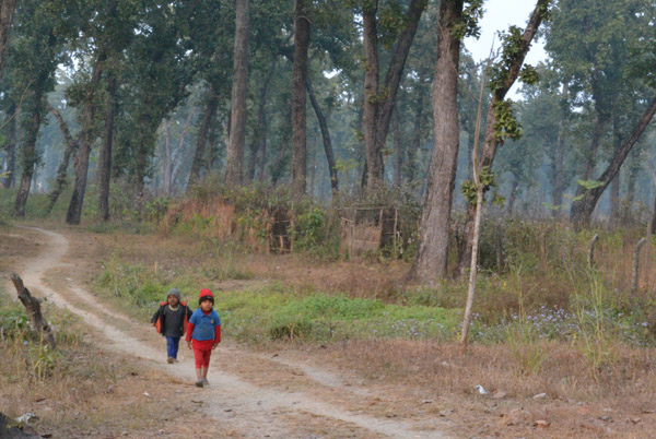Children along the buffer zone of Chitwan National Park in Nepal