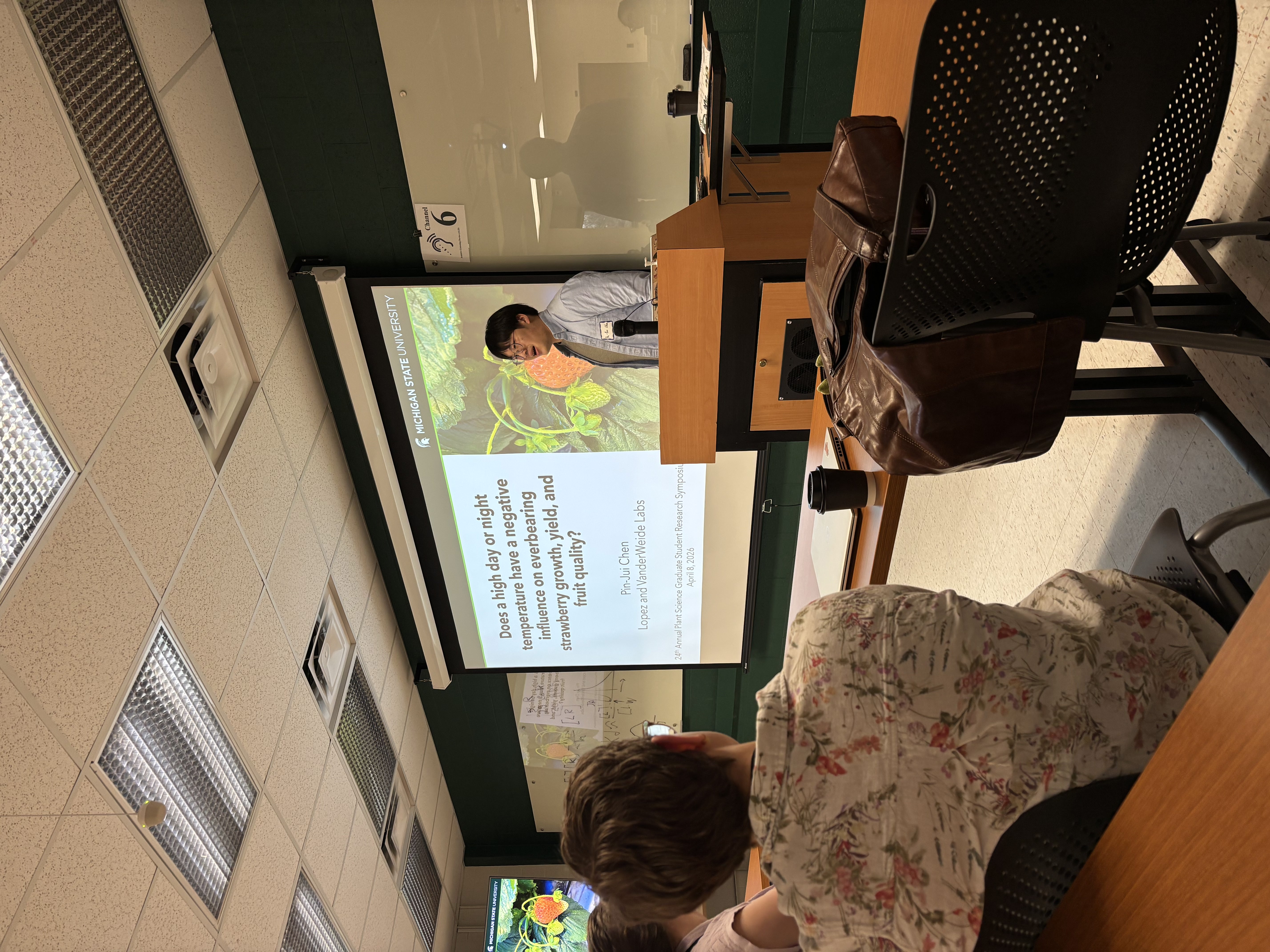 A student giving a talk on strawberries