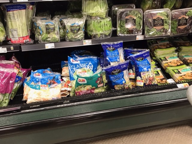 Bagged greens and salad mixes in the grocery store