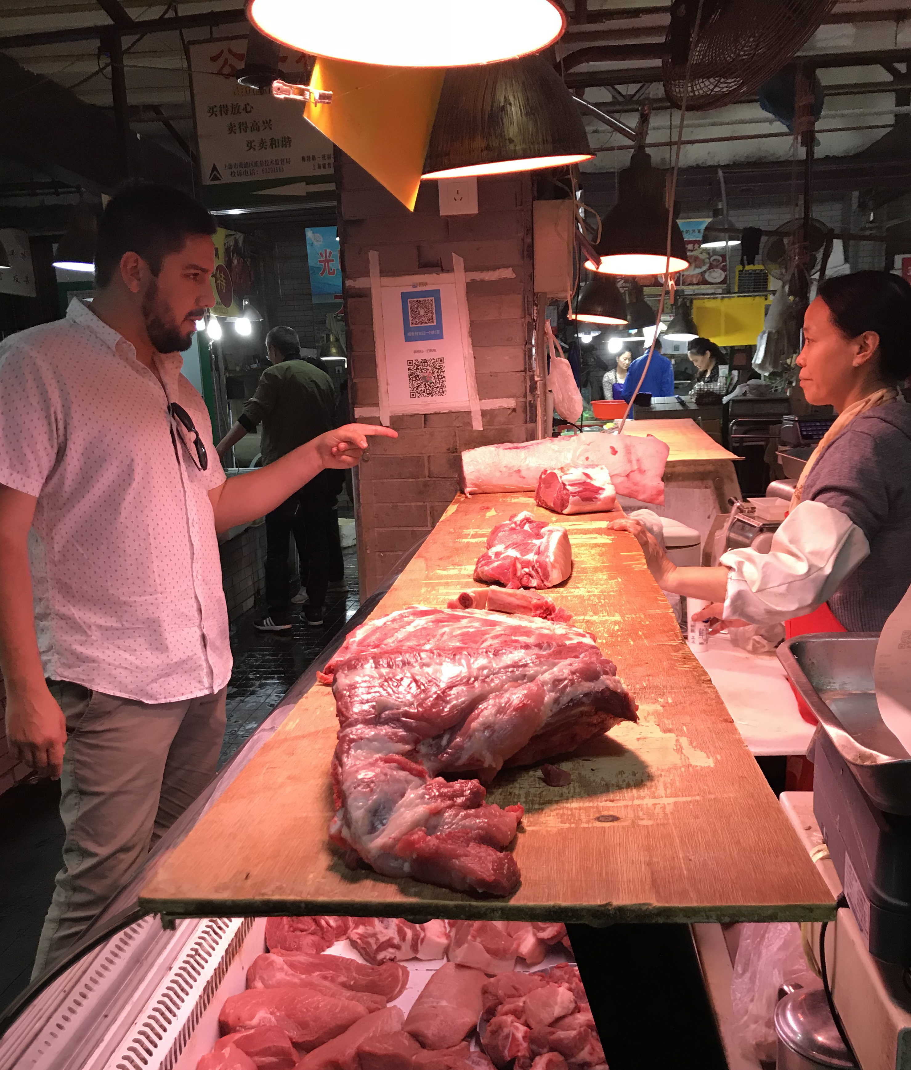 David_Ortega_talking_to_Pork_Producer_in_China