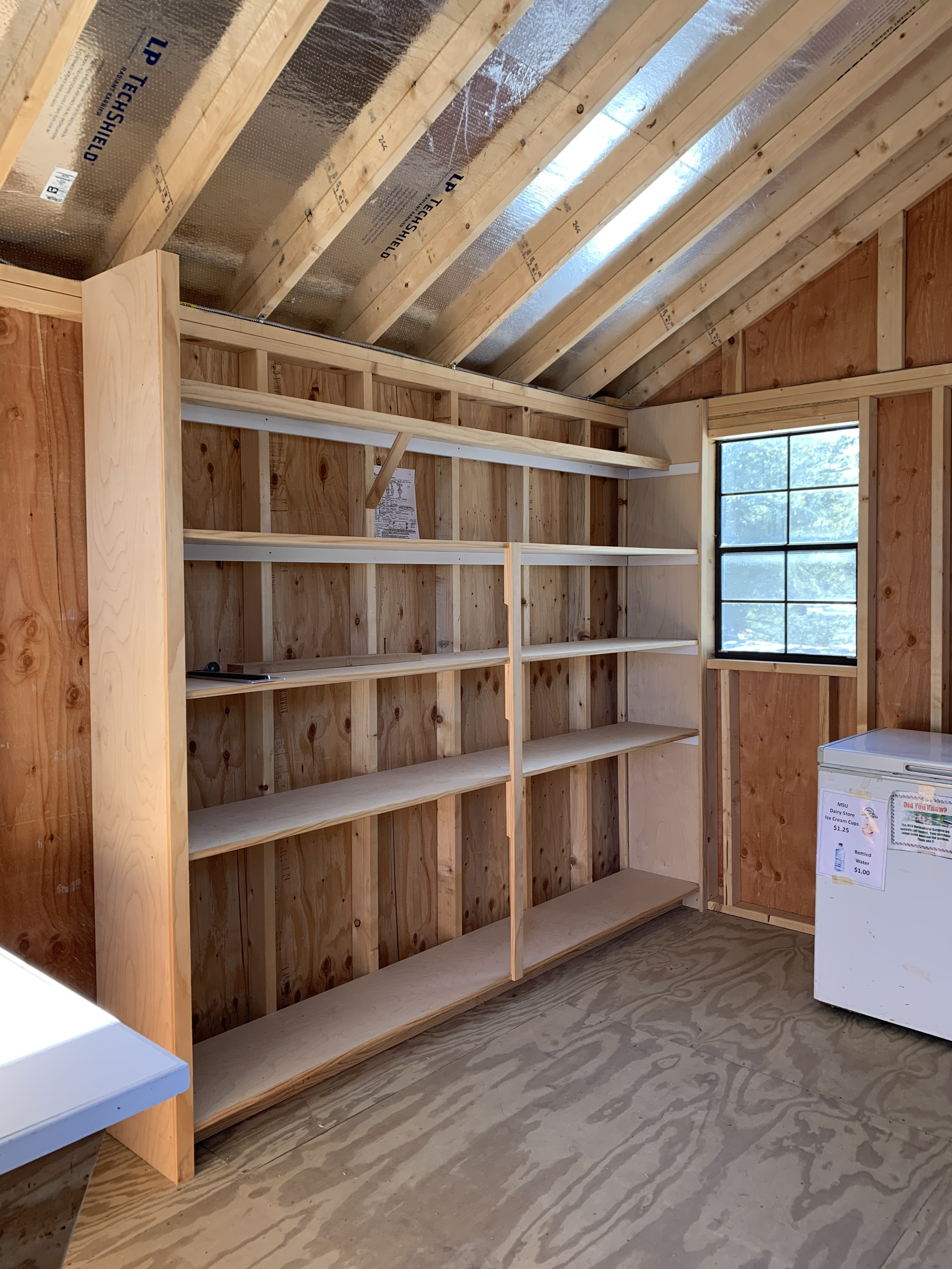 New custom built shelving and countertops for our Welcome Booth.