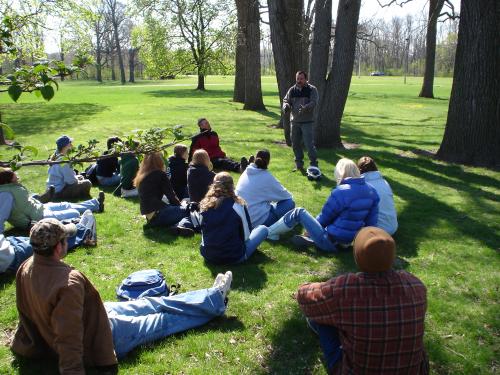 Students sitting on grass