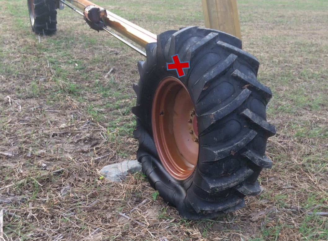 Irrigator tire in need of repair
