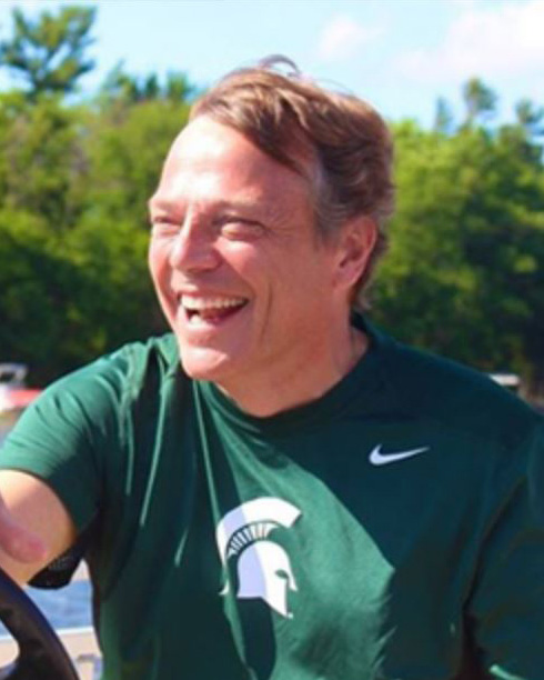 Wagner wearing Spartan shirt on a boat