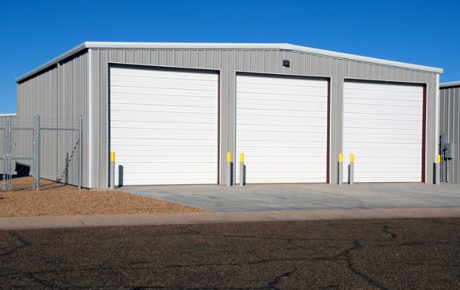 Photo depicts multiple storage facility units.