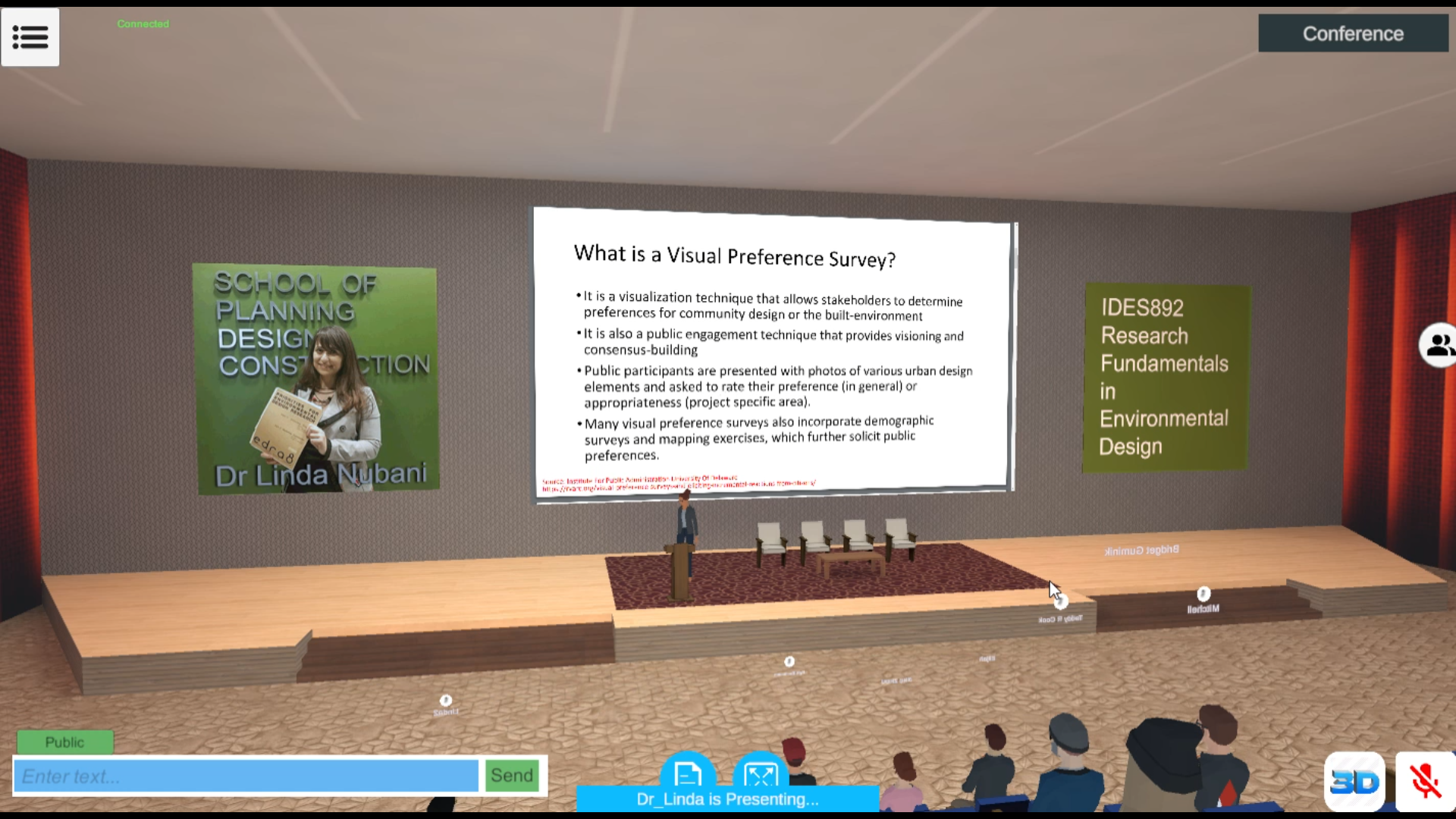 Lecture in an auditorium inside a 3D virtual reality space.