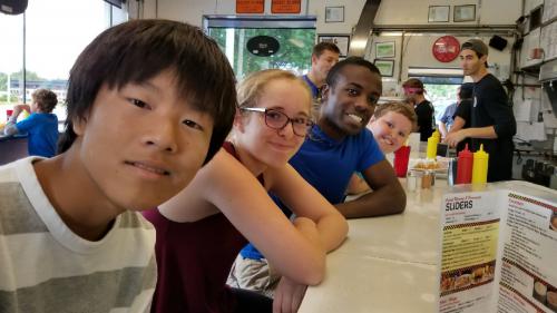 Rock Family with Taisei, exchange student from Japan, eating at an American diner.