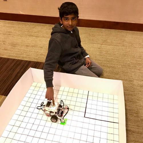 Youth at 4-H Robotics SPIN Club at Delta Township District Library