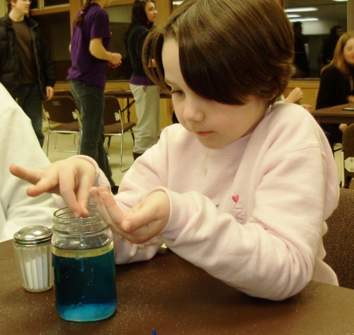 Young girl creating Lava Lamps at the Kettunen Center Science Workshop