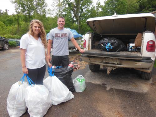 Grace and Dylan collecting pop cans fro Never Ending GRACE, a disaster fundraising effort they started.
