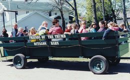 People in wagon at Friends of the Octogon Barn Annual Fall Festival