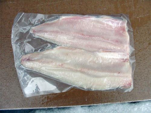 Frozen Great Lakes whitefish filets image.