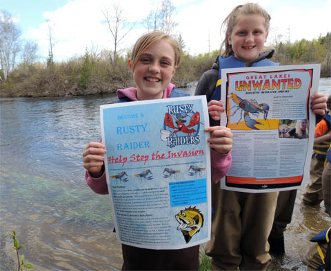 Girls with Most Wanted invasive species poster image.