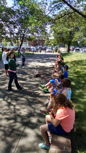 Children fish with new rods and reels.